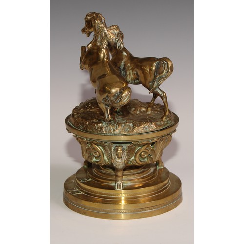 469 - A substantial sculptural 19th century French bronze inkwell, the cover cast with a pair horses power... 