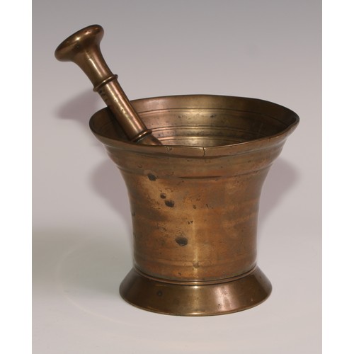 493 - An 18th century bronze bell shaped pestle and mortar, skirted base, 11.5cm high, 13cm diam, c.1760; ... 