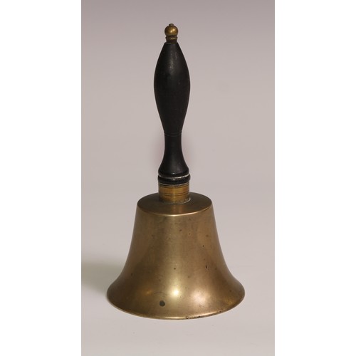 34 - A 19th century cast iron and brass desk or table bell, the base in relief with palmettes and lotus, ... 