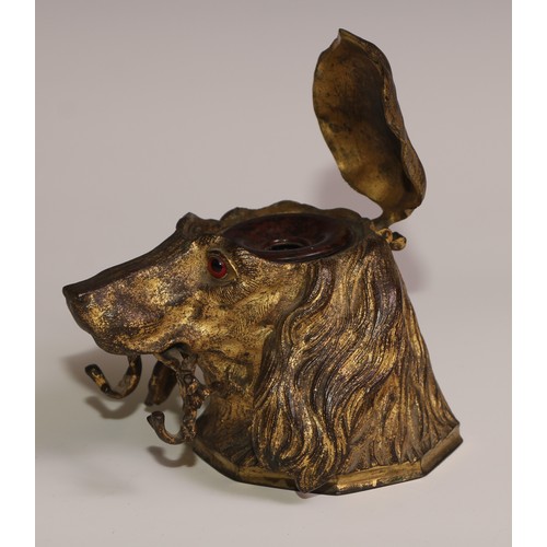 54 - A 19th century gilt metal novelty inkwell, cast as the head of a spaniel dog, hinged cover, the pen ... 