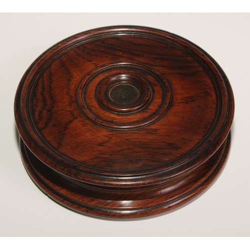 141 - A large George IV draught turned oak snuff box, push-fitting cover centred by a roundel, 15.5cm diam... 