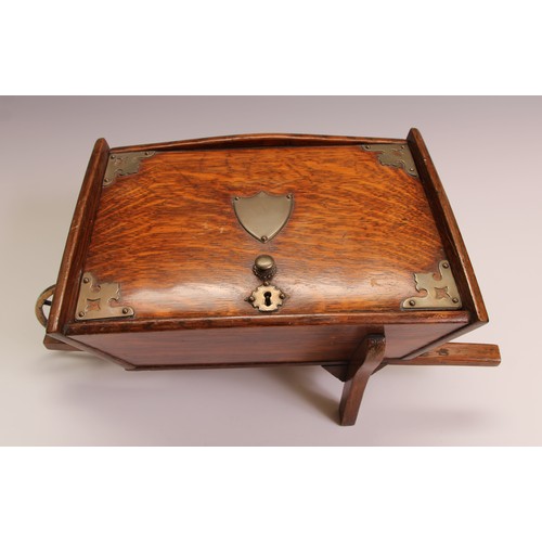 197 - A Victorian oak novelty cigar box, as a wheel barrow, hinged cover enclosing an interior fitted as a... 