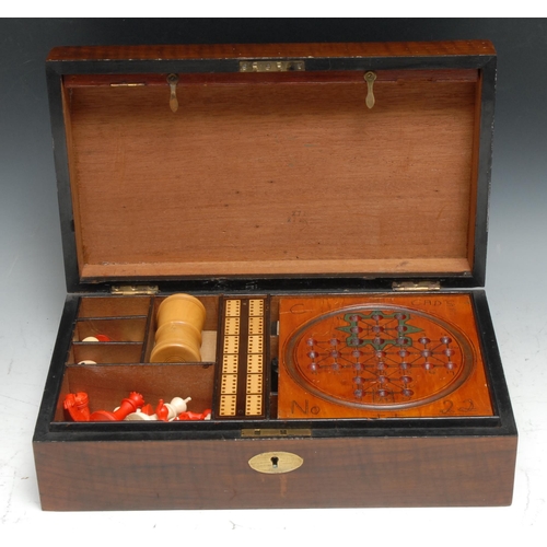 203 - A Victorian walnut games compendium, hinged cover enclosing a bone chess set, a solitaire board, a b... 