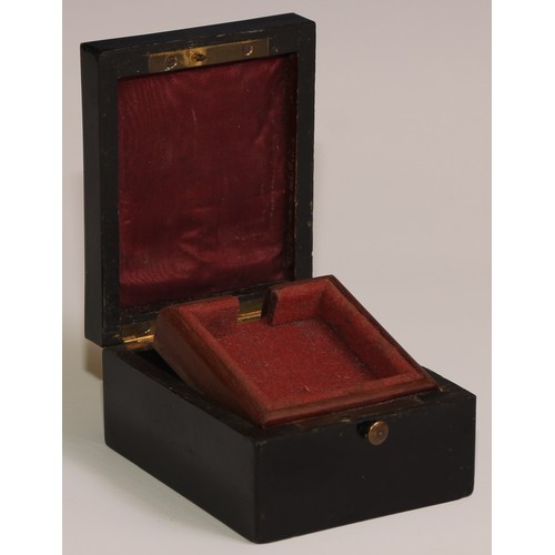 20 - A 19th century French boulle and ebonised rectangular pocket watch box, hinged cover enclosing a spr... 