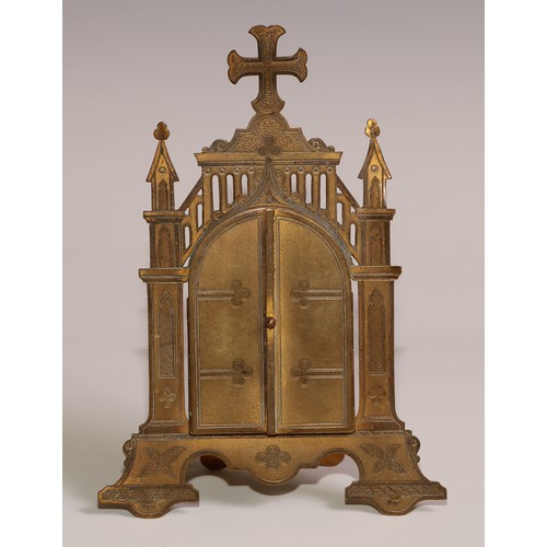 11 - A 19th century brass domestic cabinet altarpiece, the Gothic Revival easel triptych frame enclosing ... 