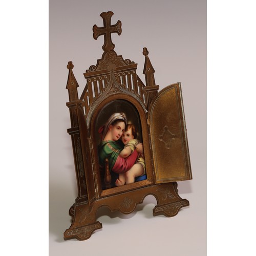 11 - A 19th century brass domestic cabinet altarpiece, the Gothic Revival easel triptych frame enclosing ... 