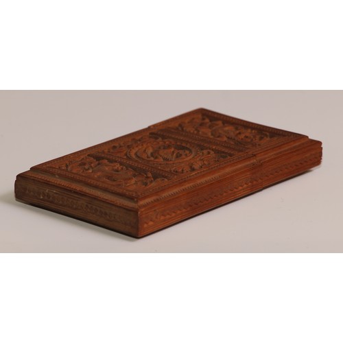 108 - A 19th century Indian sandalwood rectangular visiting card case, pierced and carved with a bird and ... 