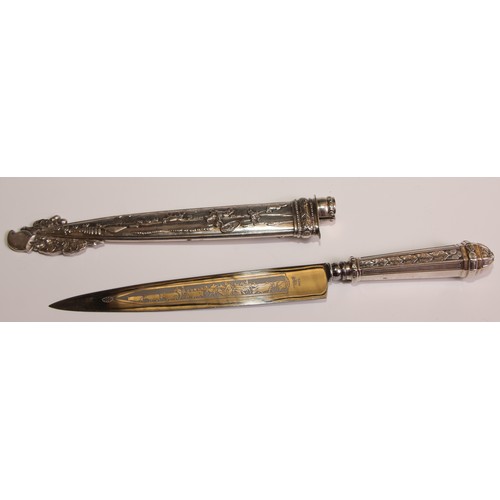 465 - A South American silvered metal gaucho knife and sheath, 18cm steel blade, decorated overall with sc... 