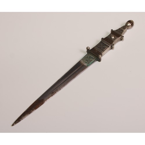 743 - A Telek silver coloured metal dagger, 13.5cm pointed fullered blade,  ovoid pommel, the scabbard tri... 