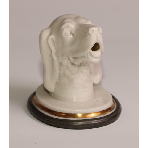 171 - A 19th century pressed glass novelty desk weight, as the head of a dog, gilt line border, lead base,... 