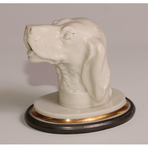 171 - A 19th century pressed glass novelty desk weight, as the head of a dog, gilt line border, lead base,... 