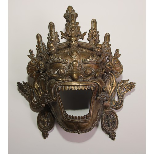 471 - A Tibetan bronze mask, cast as Yamantaka, 26cm long