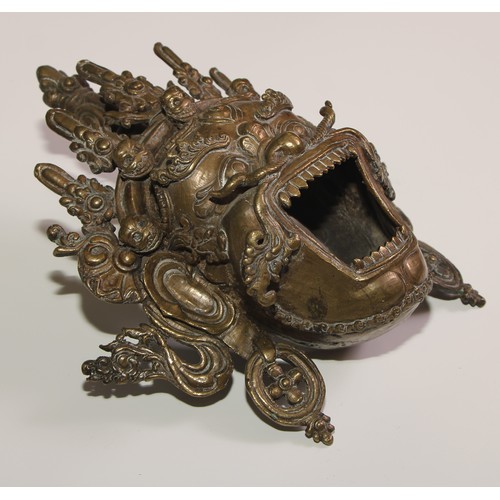 471 - A Tibetan bronze mask, cast as Yamantaka, 26cm long