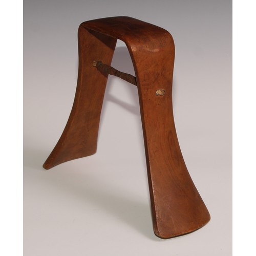 721 - Tribal Art - a Karamojong headrest, of typical inverted-U form, 23cm high, Uganda/Ethiopia; another,... 