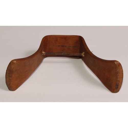 721 - Tribal Art - a Karamojong headrest, of typical inverted-U form, 23cm high, Uganda/Ethiopia; another,... 