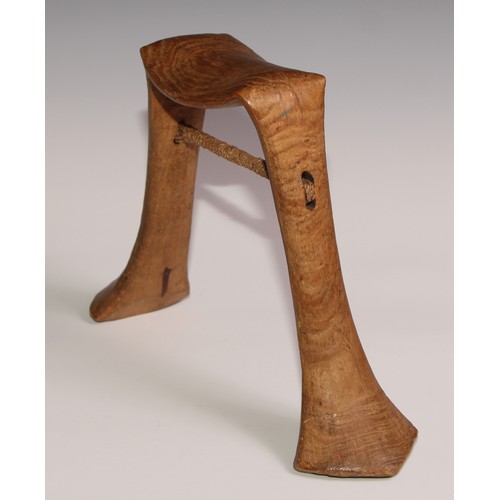 721 - Tribal Art - a Karamojong headrest, of typical inverted-U form, 23cm high, Uganda/Ethiopia; another,... 