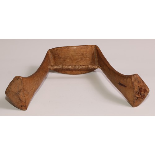 721 - Tribal Art - a Karamojong headrest, of typical inverted-U form, 23cm high, Uganda/Ethiopia; another,... 