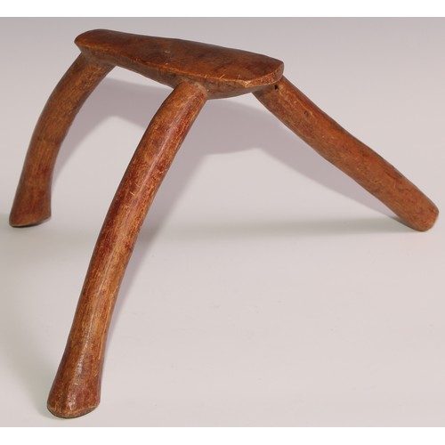 731 - Tribal Art - an East African stool or headrest, possibly Pokot, 19cm high; another (2)