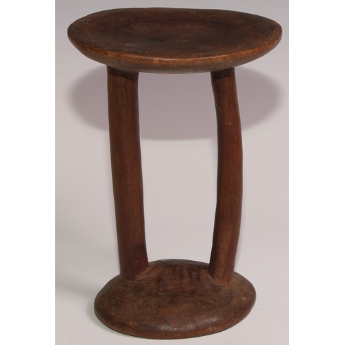 731 - Tribal Art - an East African stool or headrest, possibly Pokot, 19cm high; another (2)