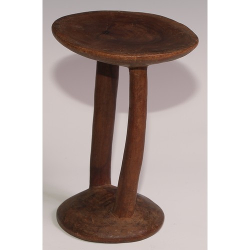 731 - Tribal Art - an East African stool or headrest, possibly Pokot, 19cm high; another (2)