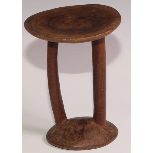 731 - Tribal Art - an East African stool or headrest, possibly Pokot, 19cm high; another (2)