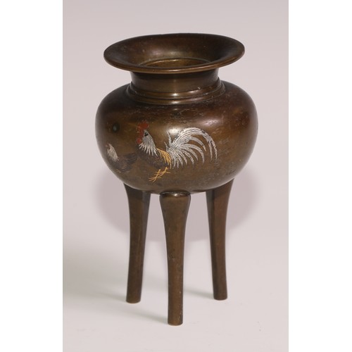 130 - A Japanese brown patinated bronze tripod koro, inlaid in silver and mixed metals with a cockerel and... 