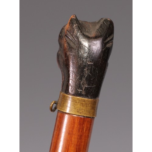 534 - An early 20th century novelty letter knife or page turner, the handle carved as the head of a pug do... 