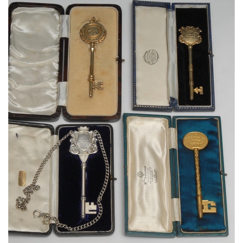 542 - An Edwardian silver presentation key, inscribed Presented to Mr John Crossley on the Occassion of hi... 