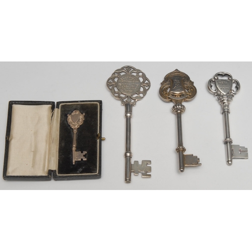 94 - Copoclephily - an Edwardian silver presentation key, Presented to B Tetlow Esq on the Occasion of th... 