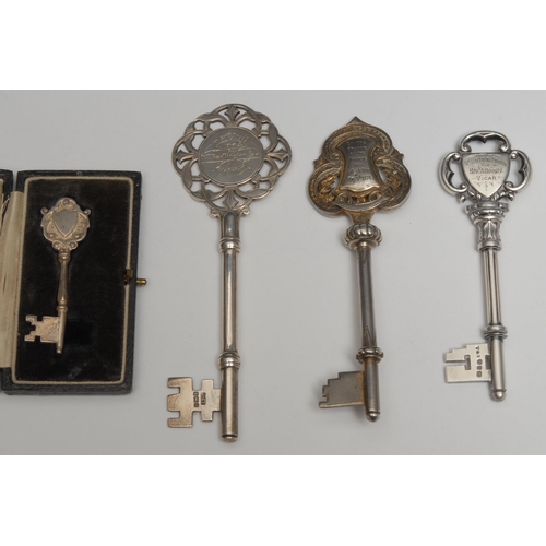 94 - Copoclephily - an Edwardian silver presentation key, Presented to B Tetlow Esq on the Occasion of th... 