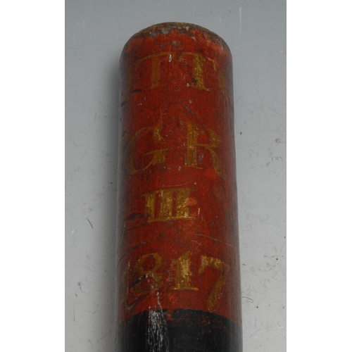 140 - A large George III turned and painted tipstaff or truncheon, inscribed in gilt upon a broad red band... 