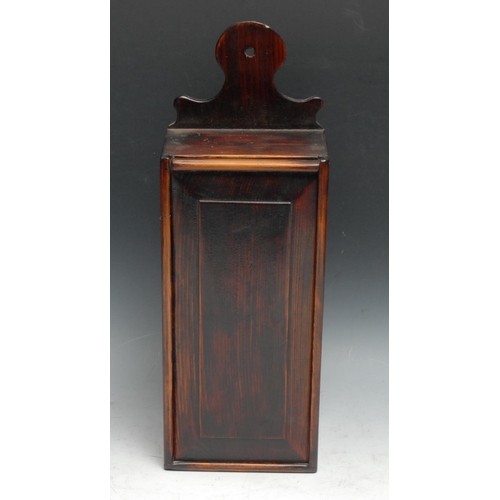 272 - A 19th century vernacular pine candle box, shaped cresting, sliding raised and fielded panelled fron... 