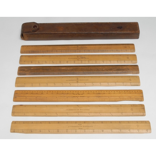 777 - A set of six early 20th century boxwood draughtsman's rulers, by A G Thornton, Manchester, leather c... 