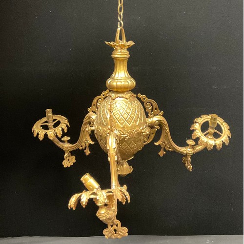 226 - Interior Decoration and Lighting - a Dutch gilt metal three-branch gasolier, in the Baroque taste, 4... 