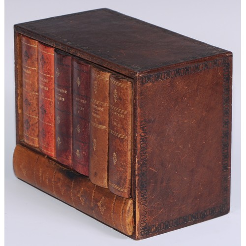 474 - A tooled and gilt leather novelty library drinks cabinet, as a row of books, the titled bindings enc... 