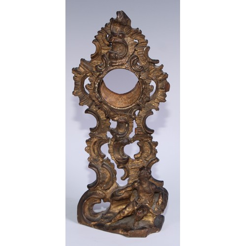 449 - A sculptural 19th century gilt wood pocket watch stand, carved in the Rococo taste with a scantily c... 