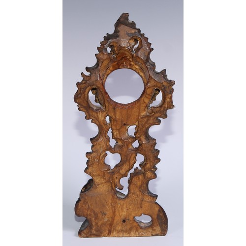 449 - A sculptural 19th century gilt wood pocket watch stand, carved in the Rococo taste with a scantily c... 