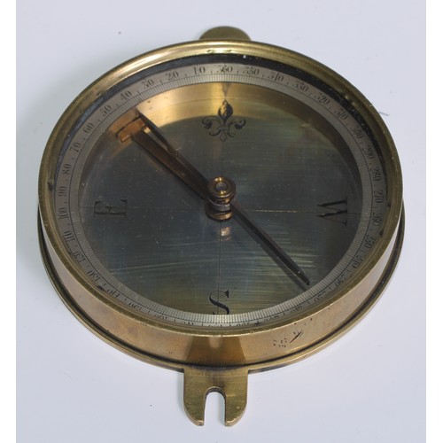 10 - A 19th century brass compass, 8.5cm silvered dial engraved with fleur-de-lys, lockable needle, 12cm ... 