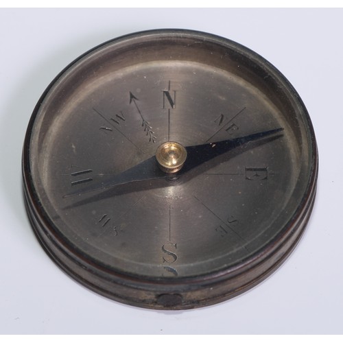 10 - A 19th century brass compass, 8.5cm silvered dial engraved with fleur-de-lys, lockable needle, 12cm ... 