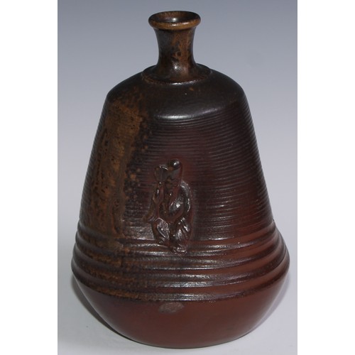 257 - A 19th century salt glazed trefoil bottle vase, the dimpled sides applied with Chinese figure, 24cm ... 