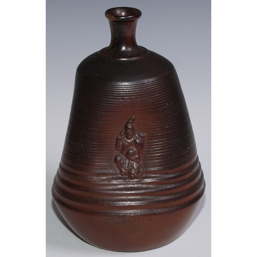 257 - A 19th century salt glazed trefoil bottle vase, the dimpled sides applied with Chinese figure, 24cm ... 