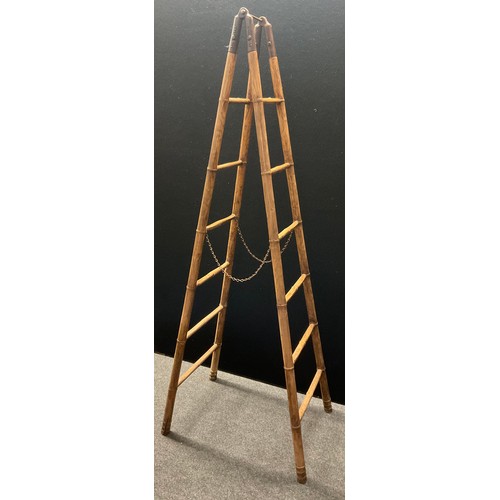 7 - A 19th century ash library ladder, faux bamboo stiles and rungs, iron fittings, 175cm high