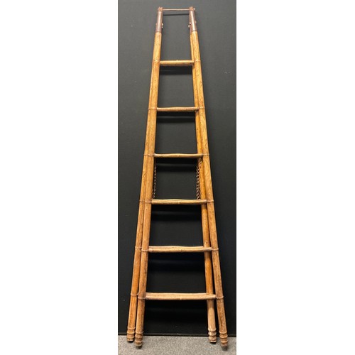 7 - A 19th century ash library ladder, faux bamboo stiles and rungs, iron fittings, 175cm high