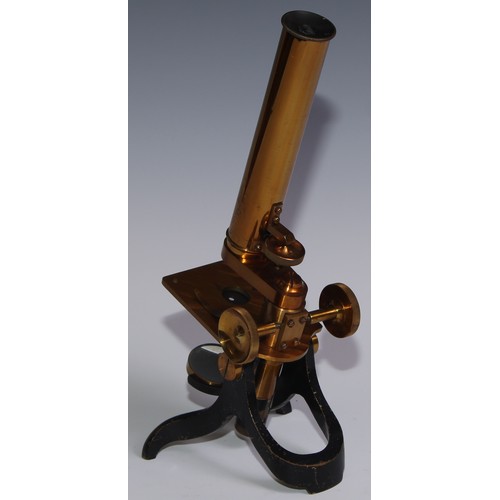 782 - An early 20th century black painted and lacquered brass monocular microscope, screw-on barrel, sub-s... 