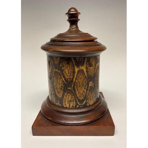 17 - A 19th century exotic timber and mahogany tobacco jar, turned cover and socle, square base, zinc lin... 