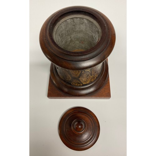 17 - A 19th century exotic timber and mahogany tobacco jar, turned cover and socle, square base, zinc lin... 