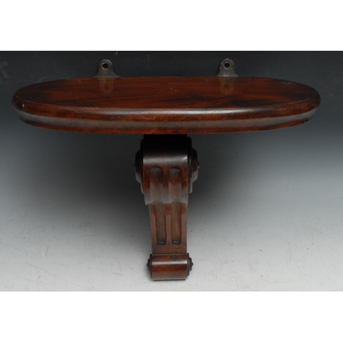 485 - A Victorian mahogany wall bracket, oval plateau, the reeded scroll support applied with draught turn... 