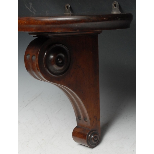 485 - A Victorian mahogany wall bracket, oval plateau, the reeded scroll support applied with draught turn... 