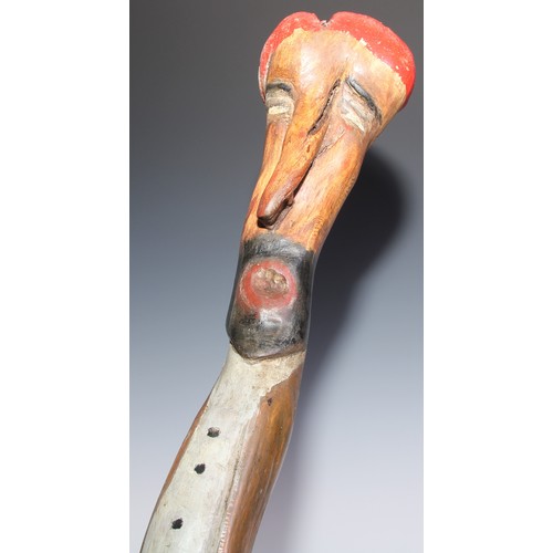 158 - Folk Art - a substantial thorn wood walking stick or cudgel, painted in polychrome as the head of a ... 