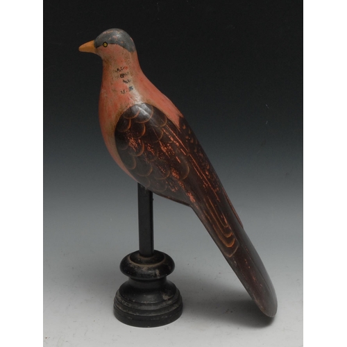 156 - Folk Art - a painted softwood avian model, of a pigeon, perched, turned ebonised stand, 33cm high